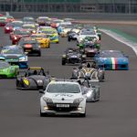 Different classes of racing cars competing together in the Birkett Six-Hour Relay at Silverstone